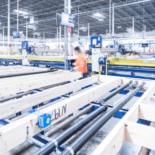 Prefabricated timber frame with MEP integration